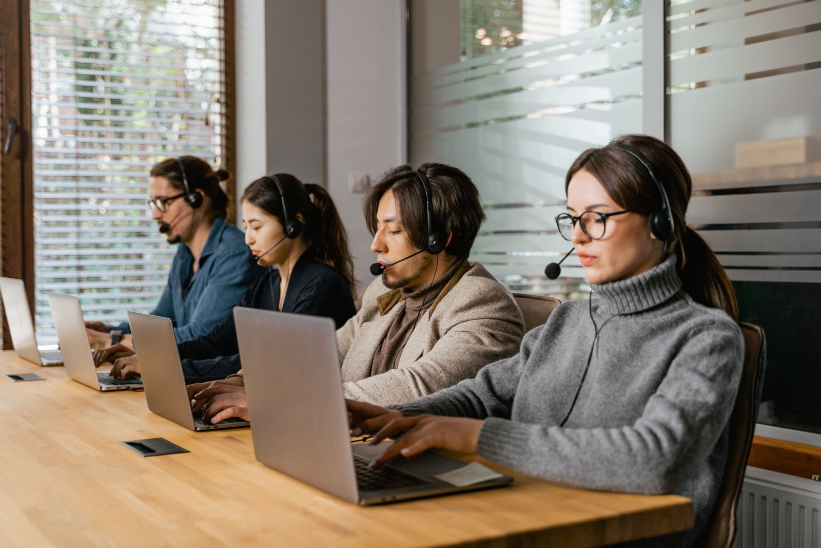 LoadHaulPro dispatchers working at their desks